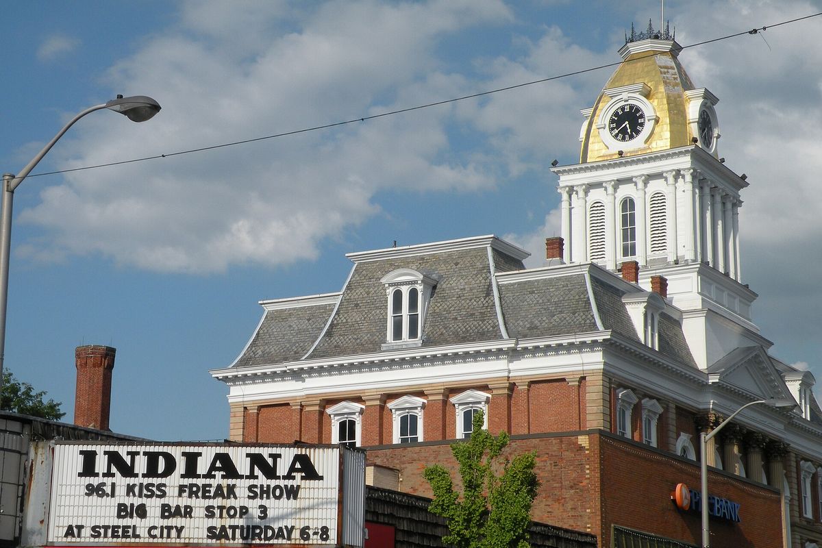 Indiana Theater marquee and the old Indiana County Courthouse in Indiana, PA