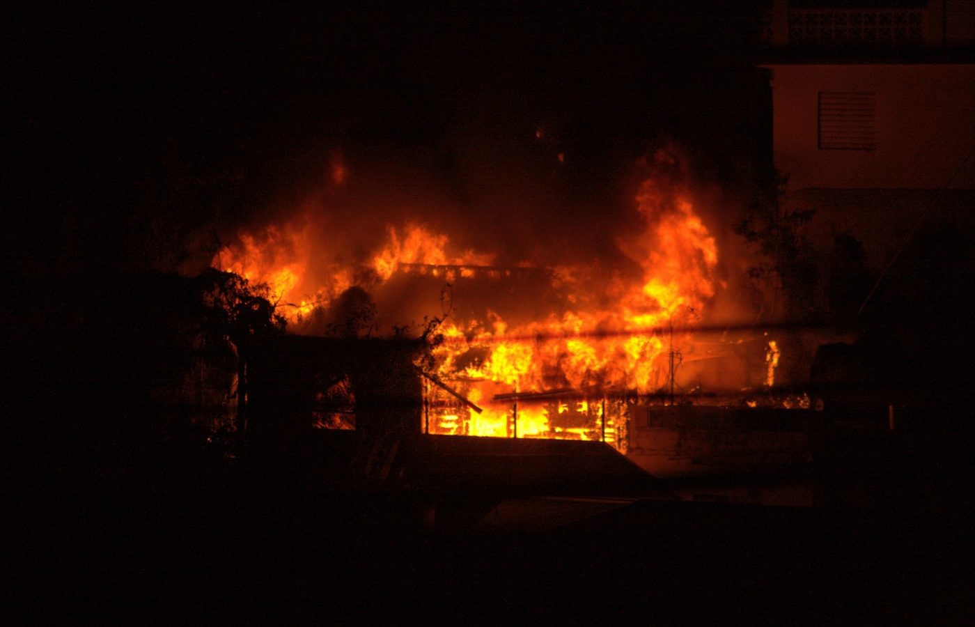 A building on fire at night